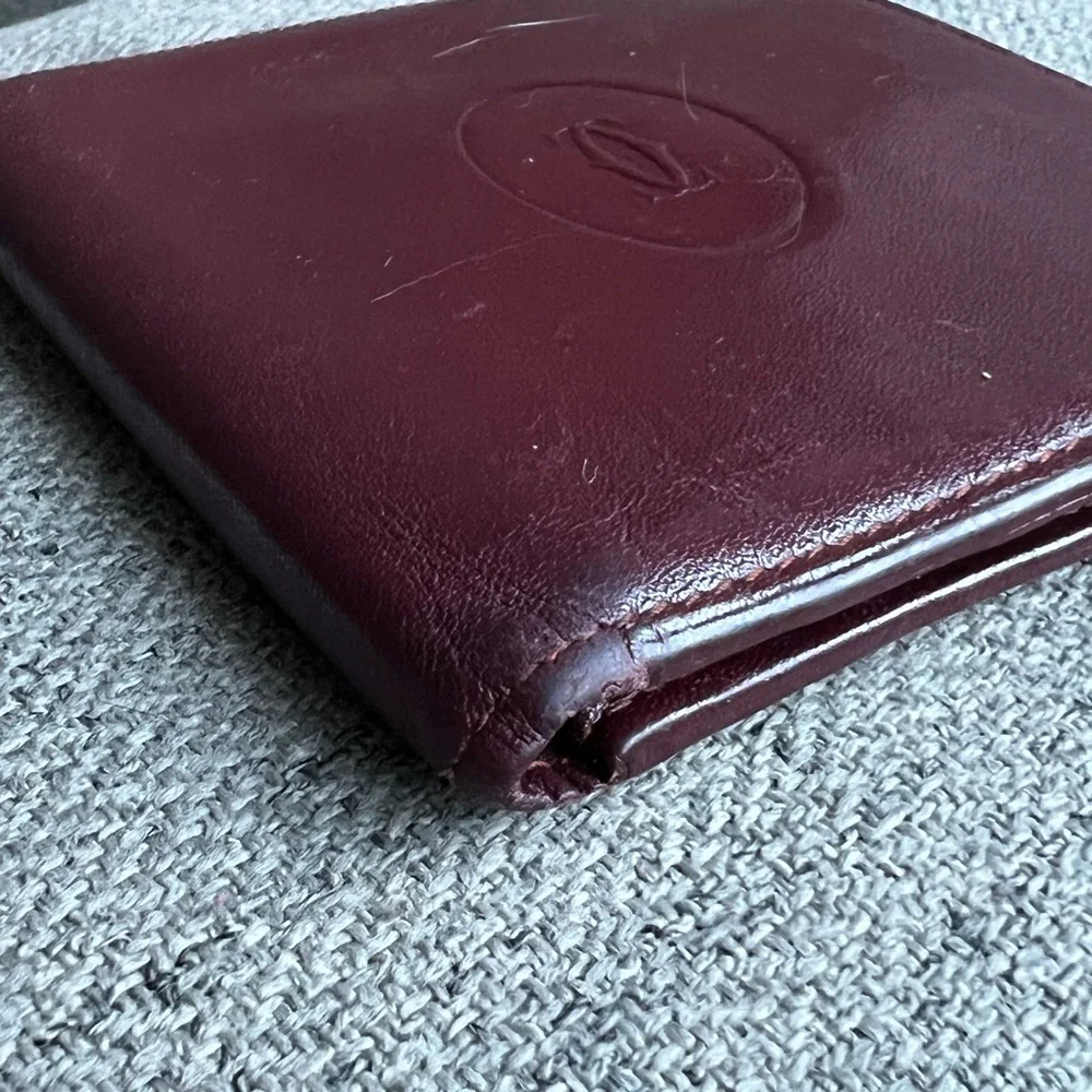 Cartier Leather Bifold Wallet with Gold Accents